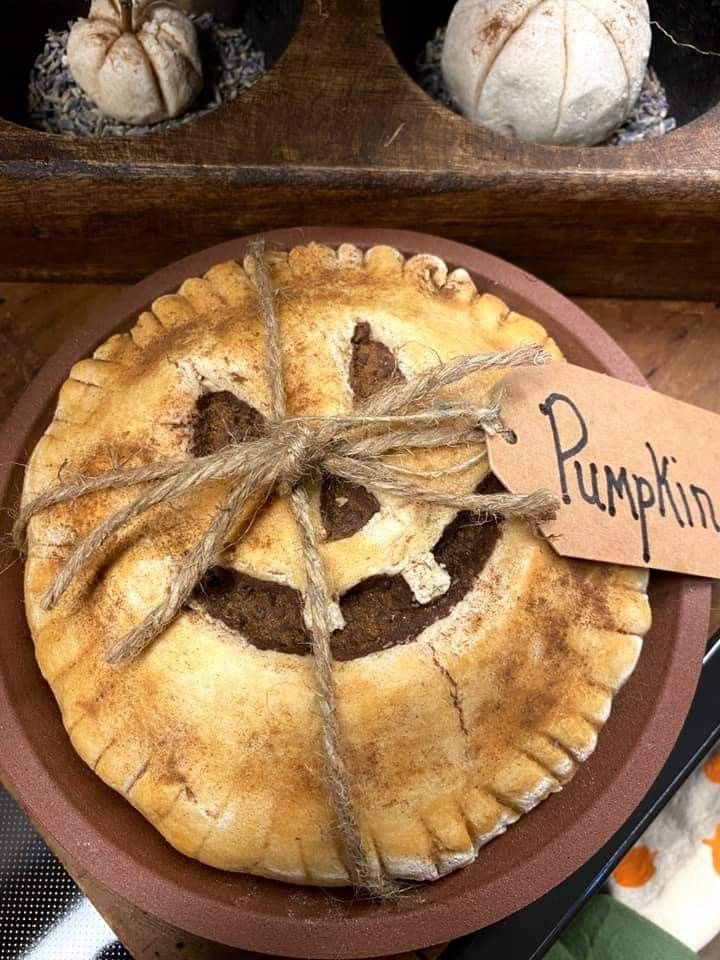 a pumpkin pie with a tag on it