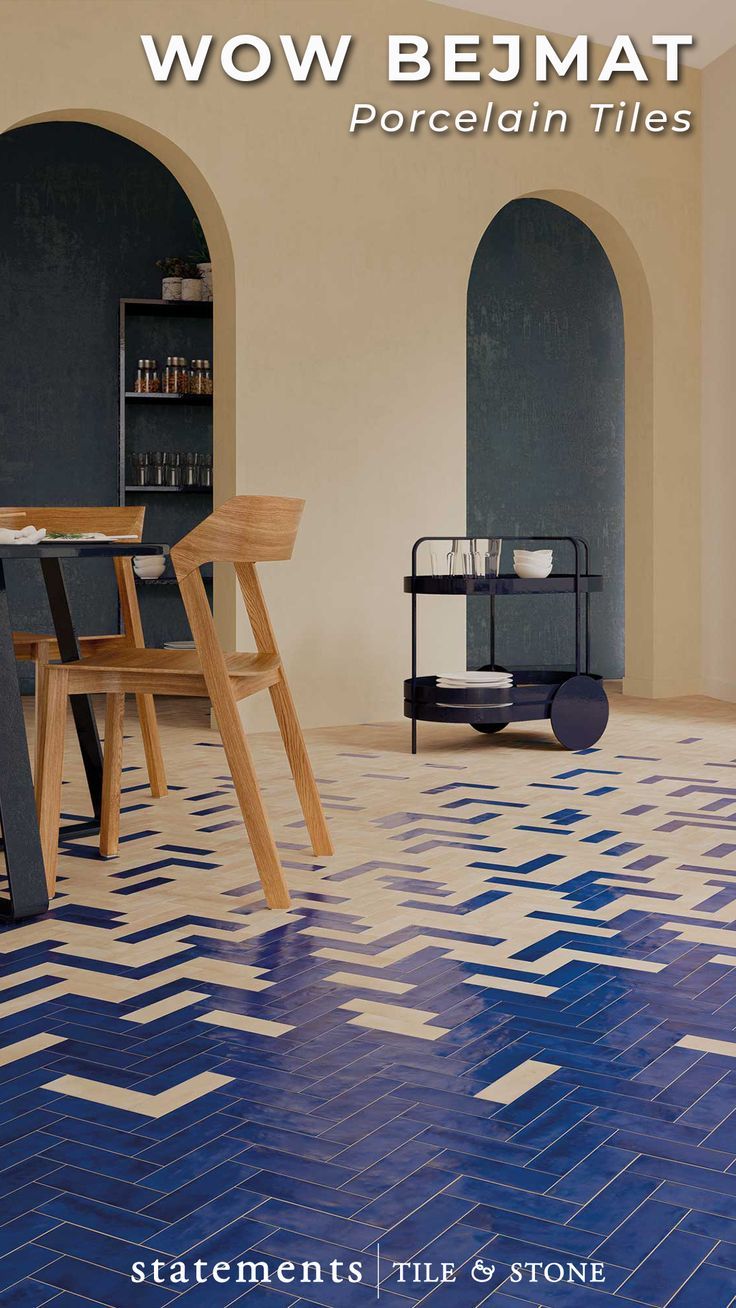 a dining room with blue and white tiles on the floor