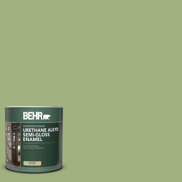 a can of behr paint on a teal blue background with the words behr written