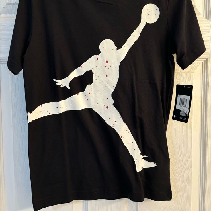 Kiss Air Jordan Short Sleeve T Shirt; Black With White Jordan Logo With Red Detailing In Logo; Size Medium 10-12; New With Tags Jordan Shorts, Jordan Logo, White Jordans, Jordan Shirts, Jordan Red, In Logo, Kids Jordans, Short Sleeve T Shirt, Kids Shirts