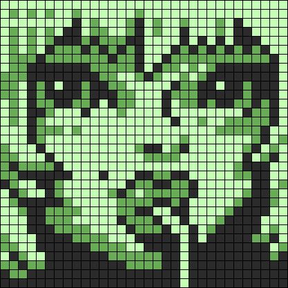 an image of the face of a woman in green and black pixellated pixels on a black background