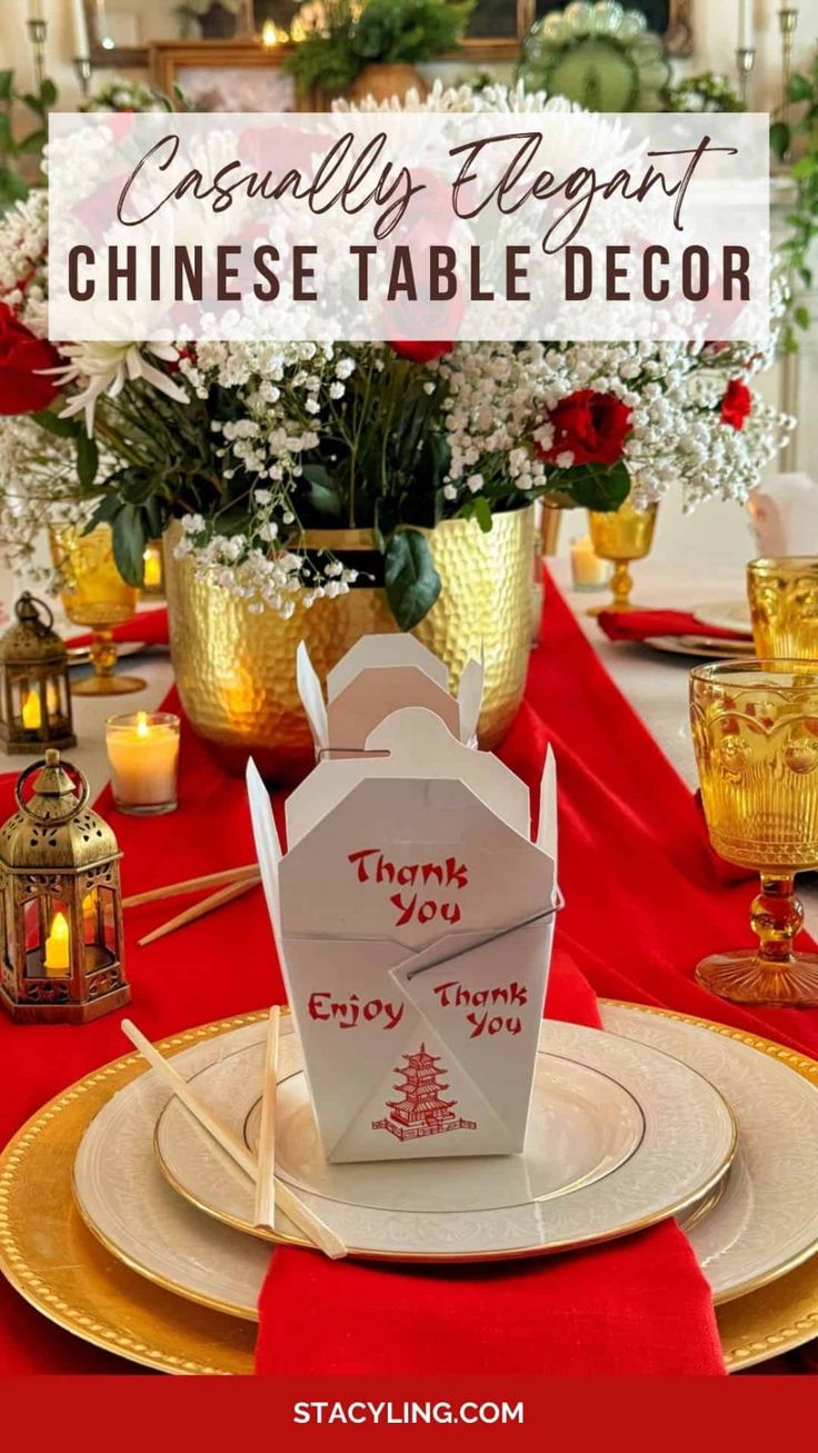 a red table cloth topped with plates and napkins covered in white paper that says, usually elegant chinese table decor