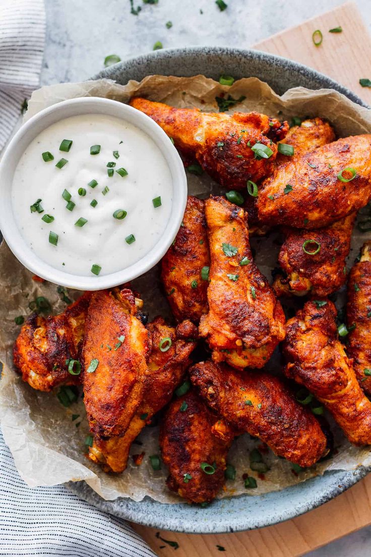 chicken wings with ranch dressing in a bowl