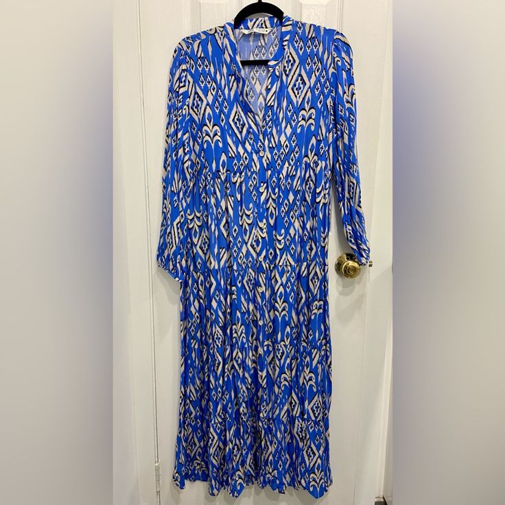 Zara Midi Button Down Dress With A Beautiful Blue And White Print, Size Small, Never Worn And In Perfect Condition! Blue Maxi Length Shirt Dress For Day Out, Blue V-neck Shirt Dress For Day Out, Blue V-neck Maxi Dress With Buttons, Spring Blue Maxi Dress With Button Closure, Blue Long Sleeve Maxi Dress With Buttons, Blue Maxi Dress With Button Closure For Spring, Long Sleeve Blue Maxi Dress With Buttons, Blue Midi Dress With Button Closure, Blue Long Sleeve Maxi Dress With Button Closure