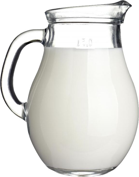 a glass pitcher filled with milk on a white background