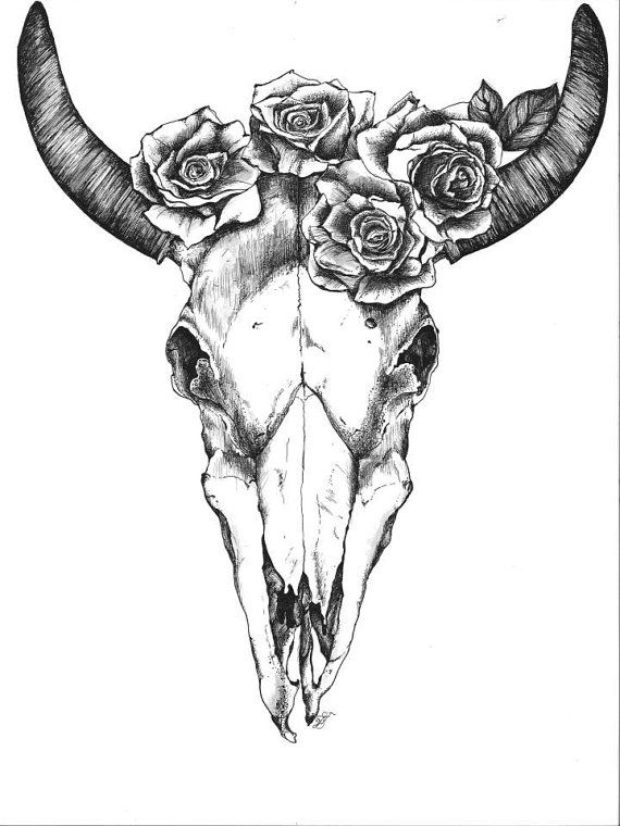 an animal skull with roses on it's head is shown in black and white