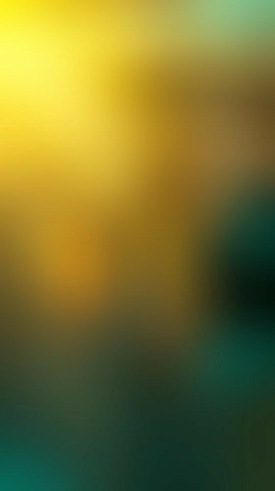 blurry image of yellow and green colors