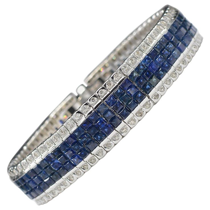 Unique Magnificent Look. Blue sapphire Invisible Bracelet AAA Quality Sapphires Total of 22.00 carat. with Diamonds on the sides total of 2.00 carat GH-SI. 14K White Gold 49.0 Grams. Lenght 7' Inch. Bracelet widith is approx 13 mm Antique Gold Bracelet, Blue Sapphire Bracelet, Antique Bracelets, Sapphire Bracelet, Vintage Bracelets, White Gold Diamonds, Link Bracelets, Antique Gold, Jewelry Inspiration