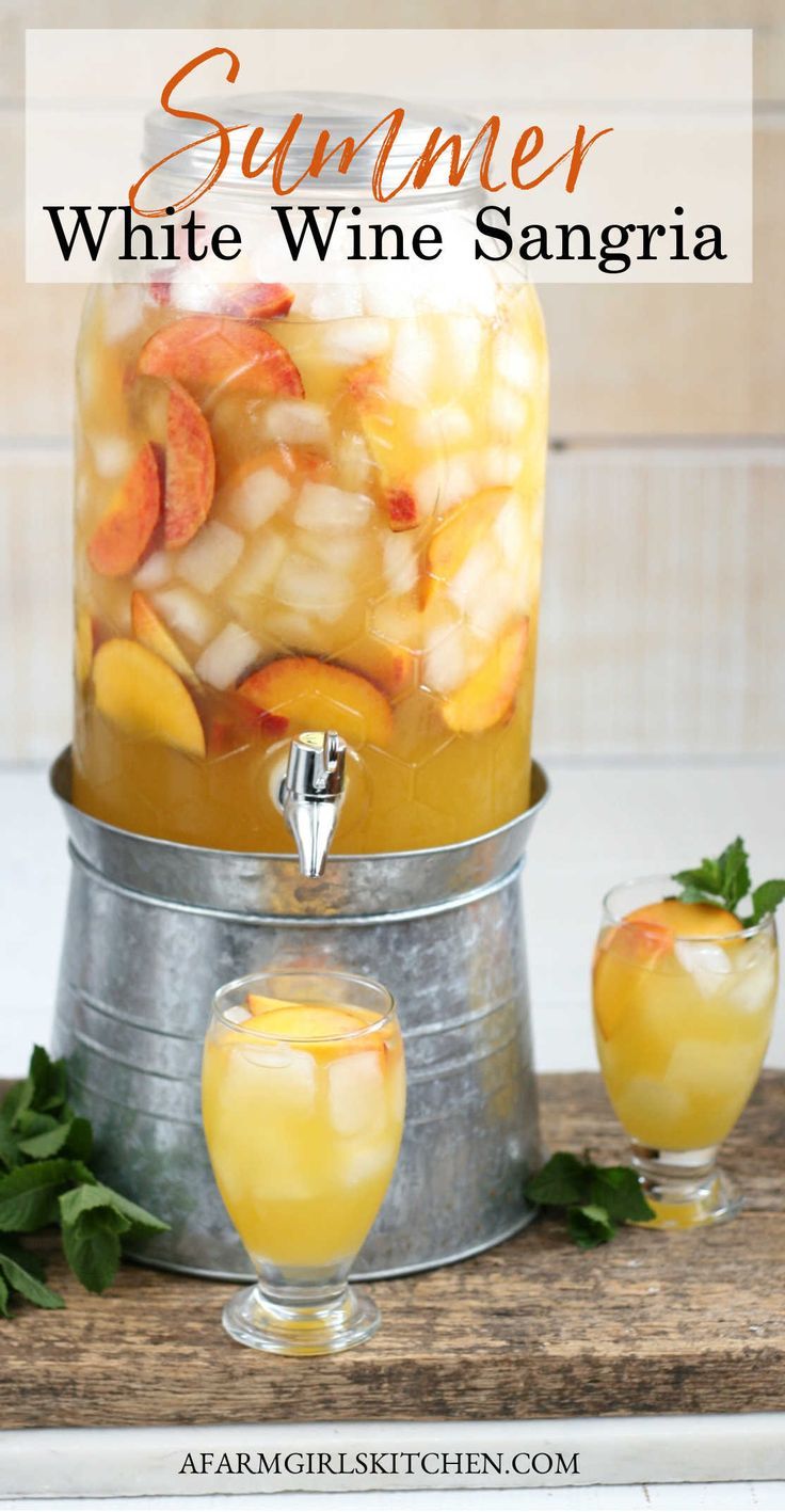 a glass jar filled with fruit and water