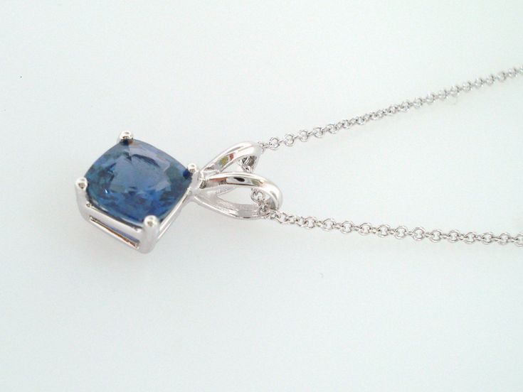 "HERE IS BEAUTIFUL CUSHION CUT CEYLON BLUE SAPPHIRE SOLITAIRE PENDANT NECKLACE 14 KARAT WHITE GOLD AVAILABLE YELLOW OR ROSE GOLD TOO ASK ME PLEASE COMES WITH 16\" OR 18\" INCH CHAIN CENTER CUSHION CUT CEYLON BLUE SAPPHIRE VERY SWEET LIGHT BLUE COLOR & CLEAN SAPPHIRE !! CENTER SHAPE- CUSHION CUT CUT- VERY GOOD CLARITY- AA COLOR- BLUE CARAT- 1.16ct MEASUREMENT- 5.95 X 5.90 mm TOTAL 1.16 CARAT RETAIL PRICE IS OVER $2,800.00 COMES WITH $2,250.00 CERTIFIED APPRAISAL !! DREAM IT I\"LL MAKE IT SPEC Elegant Blue Hallmarked Necklace, Formal Blue Hallmarked Necklace, Formal Blue Hallmarked Necklaces, Formal Hallmarked Blue Necklaces, Formal Cushion Cut Gemstone Necklace, Formal Blue Sapphire Jewelry, Blue Sapphire Cushion Cut Jewelry, Blue Cushion Cut Sapphire Jewelry, Blue Cushion Cut Diamond Jewelry