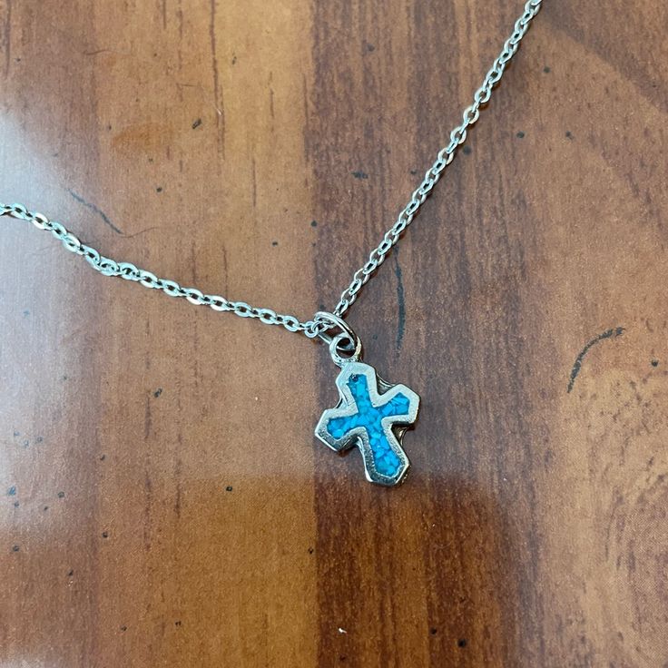 16” Sterling Silver Chain With Silver And Blue Turquoise Stone Cross Pendant. Never Worn, Great Condition Nickel-free Blue Metal Charm Necklaces, Adjustable Turquoise Necklace For Gift, Adjustable Turquoise Necklace As A Gift, Adjustable Light Blue Turquoise Necklace Gift, Blue Sterling Silver Charm Necklace Nickel Free, Blue Sterling Silver Charm Necklace, Nickel Free, Adjustable Hypoallergenic Blue Necklaces, Adjustable Blue Hypoallergenic Necklace, Adjustable Hypoallergenic Blue Necklace