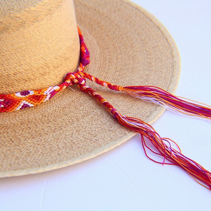 These Beautiful hat bands are carefully hand woven by Rosa in Chiapas,Mexico. Each band showcases a unique and colorful patterned design using traditional macrame techniques. Add a touch of handmade artistry to your hat collection today! Width 1” Length: 23 inches, not including fringe Fringe 9” each side , for an adjustable fit. Fits most hats Polyester yarn All items are shipped from US. All Mi Mundo Mexicano items are 100% handmade by artisans in Mexico. Each stitch and item is completely uni Braided Hat Bands For Festivals With Flat Brim, Adjustable Handwoven Festival Hat, Traditional Adjustable Handwoven Hat Bands, Adjustable Braided Bohemian Hat Bands, Adjustable Southwestern Straw Hat For Festivals, Southwestern Adjustable Straw Hat For Festivals, Southwestern Style Adjustable Straw Hat For Festival, Casual Adjustable Handwoven Hats, Adjustable Flat Brim Handwoven Panama Hat