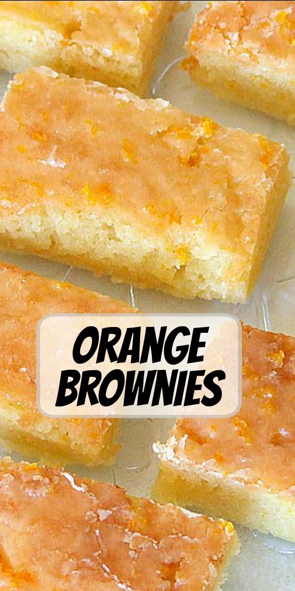 orange brownies sitting on top of a table next to each other with the words orange brownies above them