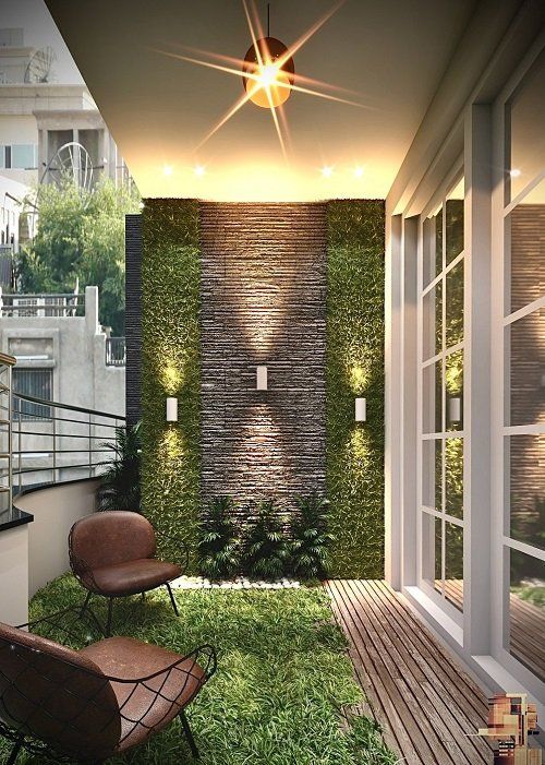 an outdoor living area with grass and lights