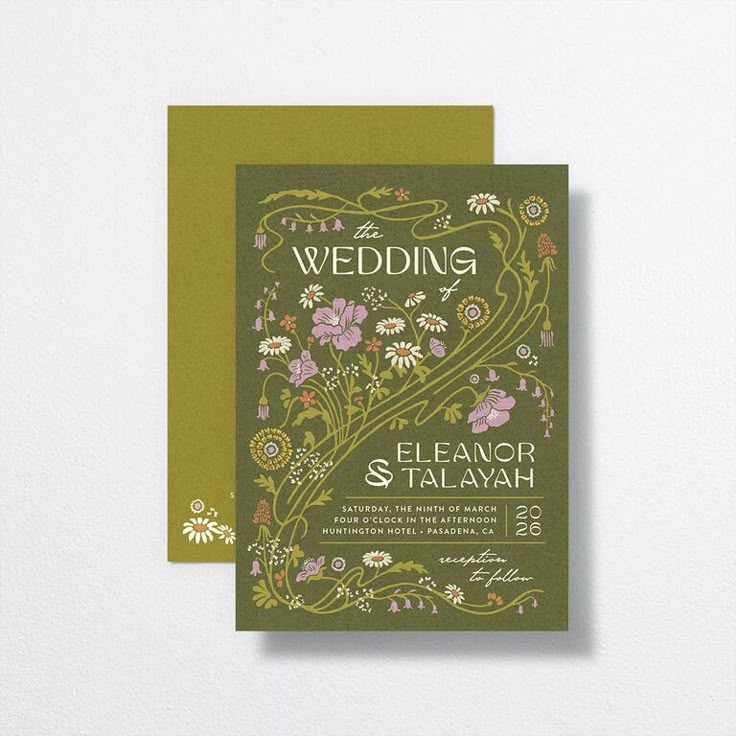 a wedding card with flowers and vines on it