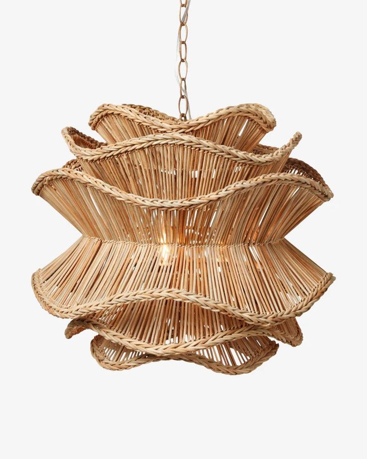 a chandelier made out of wicker hanging from a chain on a white background