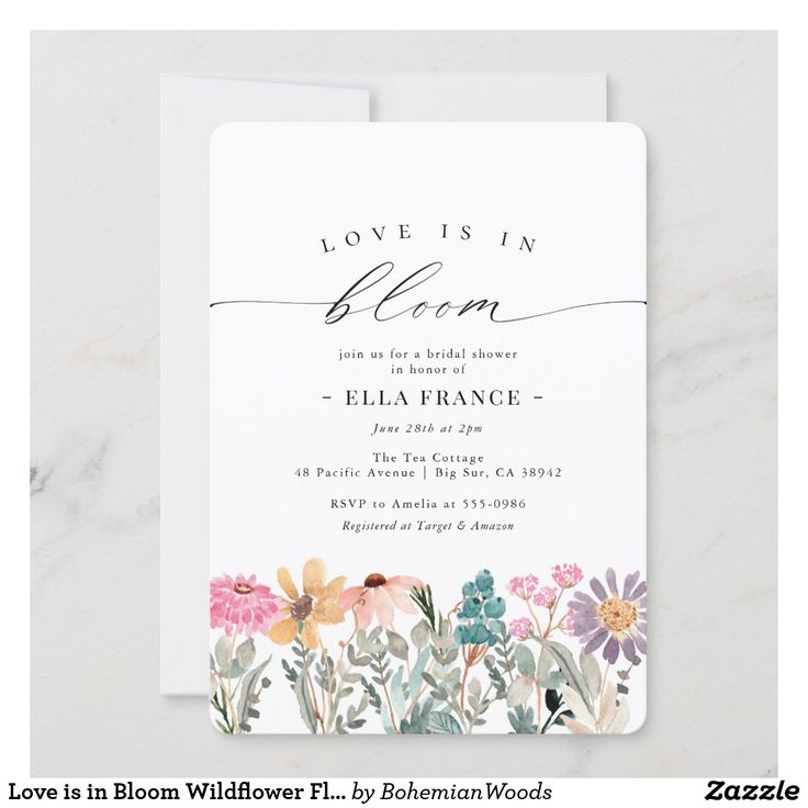 a wedding card with watercolor flowers and the words, our little wildflowers is turning one