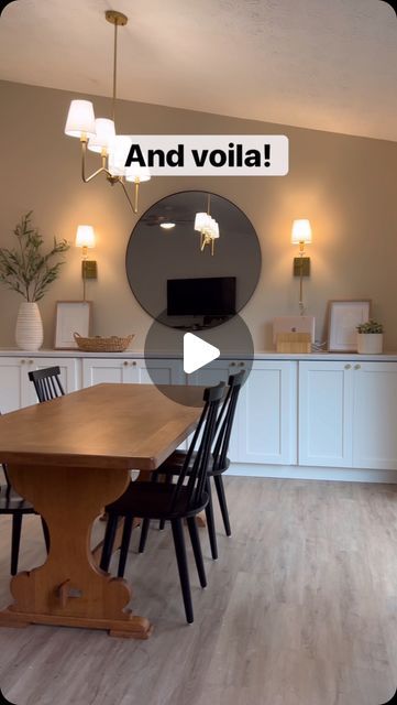 a dining room table and chairs with the words and voila on it in front of a tv