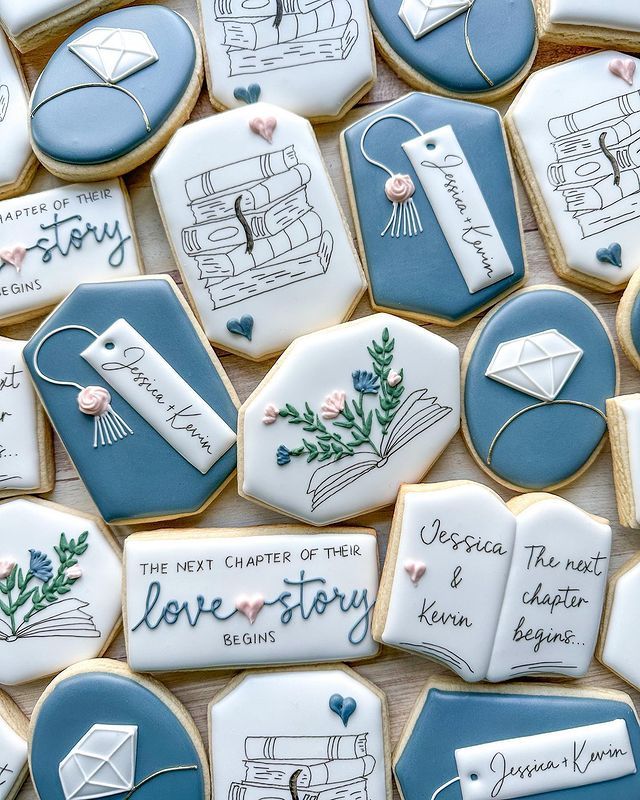 some cookies that are decorated with different types of books and writing on them, including one for love story