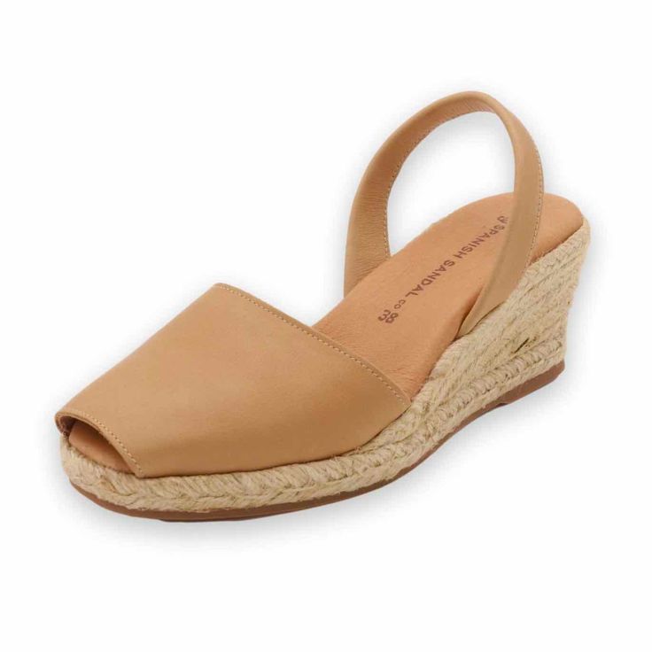 Are you looking for stylish and comfortable sandals that will fit with any outfit? Look no further than our espadrille wedges. These classic Spanish sandals are designed to provide you with the perfect blend of chic and comfort. Whether you’re wearing a dress or more casual jeans, these sandals will have you looking yo Vacation Espadrille Wedge Sandals, Espadrille Wedge Sandals For Vacation, Beige Wedge Heel Slingback Sandals For Summer, Summer Espadrille Wedge Sandals, Summer Closed Toe Espadrille Wedge Sandals, Beach Wedge Heel Slingback Sandals With Cushioned Footbed, Espadrille Closed Toe Wedge Sandals For Vacation, Closed Toe Espadrille Wedge Sandals For Vacation, Natural Espadrilles For Vacation