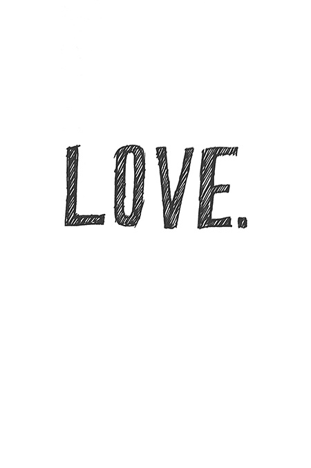 the word love written in black ink on a white background