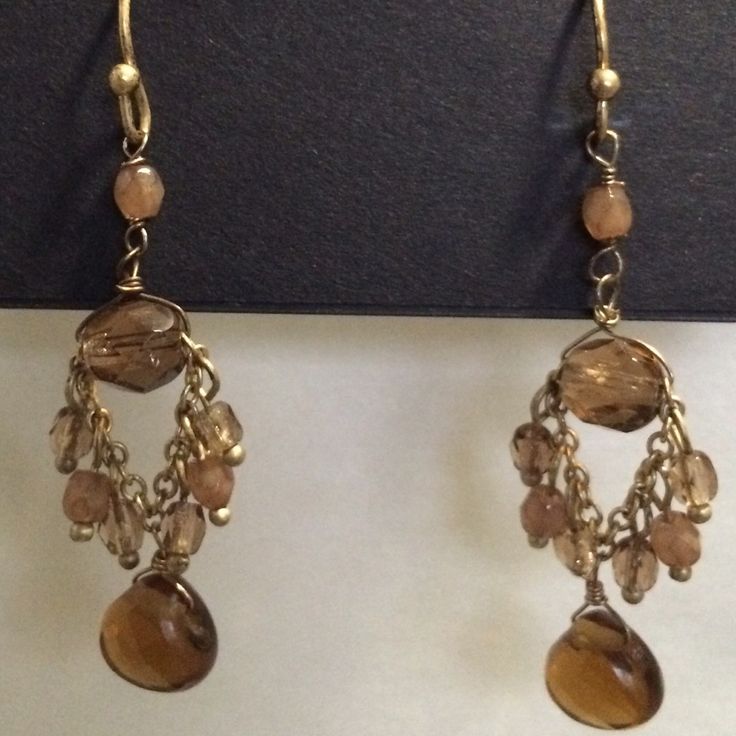 Nwt Brown Stones And Gold Hardware. 1 1/2" Drop. Elegant Brown Chandelier Earrings, Elegant Beaded Drop Earrings With French Hook, Elegant Brown Earrings With Dangling Beads, Elegant Brown Beaded Dangle Earrings, Elegant Brown Dangle Earrings, Elegant Brown Metal Beaded Earrings, Elegant Brown Chandelier Earrings With Dangling Beads, Elegant Teardrop Beaded Earrings In Brown, Elegant Brown Teardrop Beaded Earrings