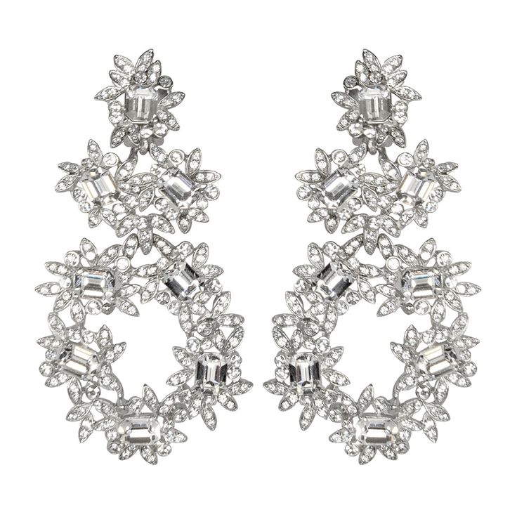 Product Description: These stunning rhodium-plated, rhinestone-adorned flower drop clip-on earrings are the perfect accessory for any formal occasion. Dimensions: 3" x 1.75" Style Number: 6379ESC NOW ACCEPTING PRE-ORDERS. RESTOCK ETA IS 11/30/24. Crystal Stone Jewelry, Silver Flower Earrings, Flower Clip, Silver Crystal, Shopify Theme, Crystal Flower, Kenneth Jay Lane, Fall 2018, Clip Earrings