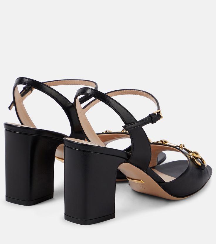 Horsebit leather sandals in black - Gucci | Mytheresa Formal Calf Leather Sandals With Rectangular Buckle, Luxury Calf Leather Sandals With Rectangular Buckle, Open Toe Calf Leather Heels With Tang Buckle, Luxury Black Sandals With Rectangular Buckle, Calf Leather Open Toe Heels With Tang Buckle, Luxury Leather Heels With Rectangular Buckle, Chic Calf Leather Sandals With Tang Buckle, Designer Calf Leather Sandals With Rectangular Buckle, Gucci Ankle Strap Sandals With Buckle Closure