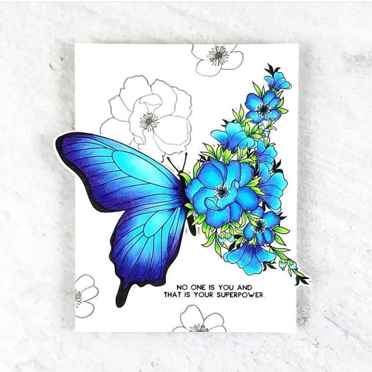 a card with blue flowers and a butterfly on it