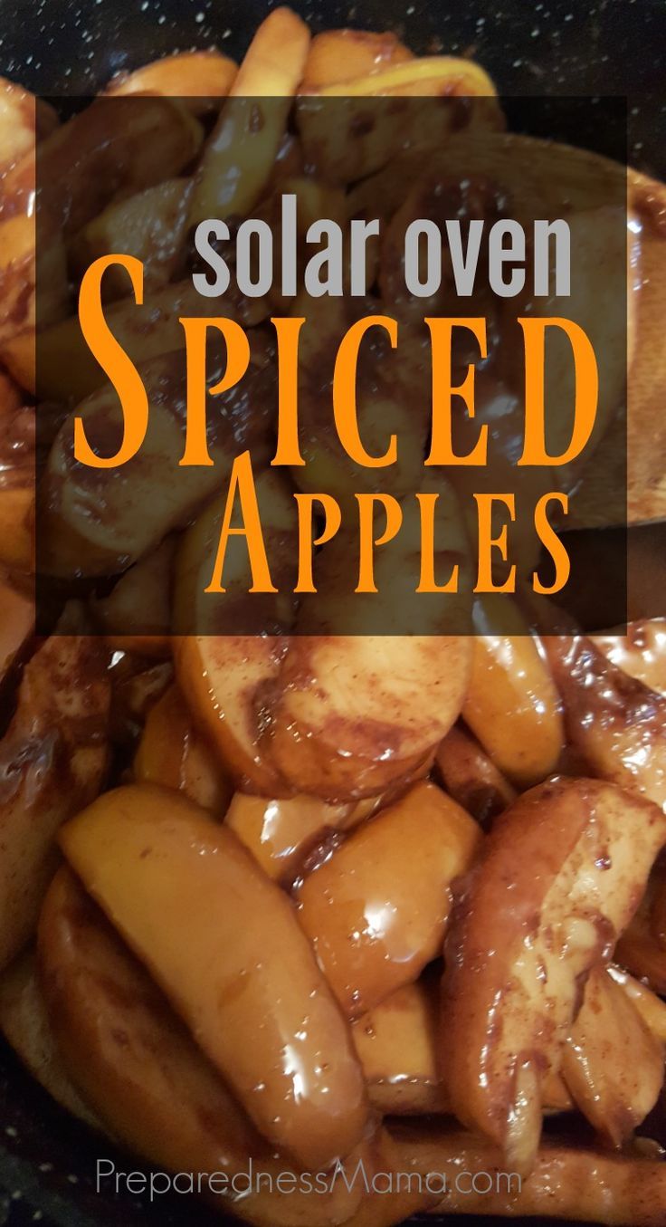 the words solar oven spiced apples are in orange and black