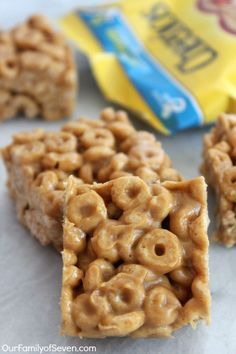 three pieces of cereal krispy kreme on a table