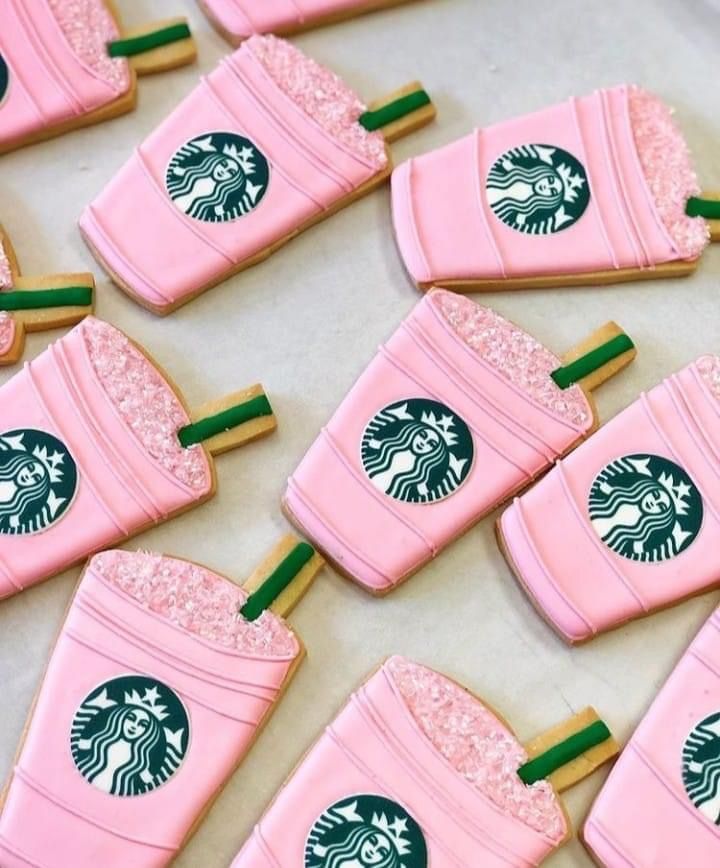 iced cookies decorated like starbucks cups with green straws