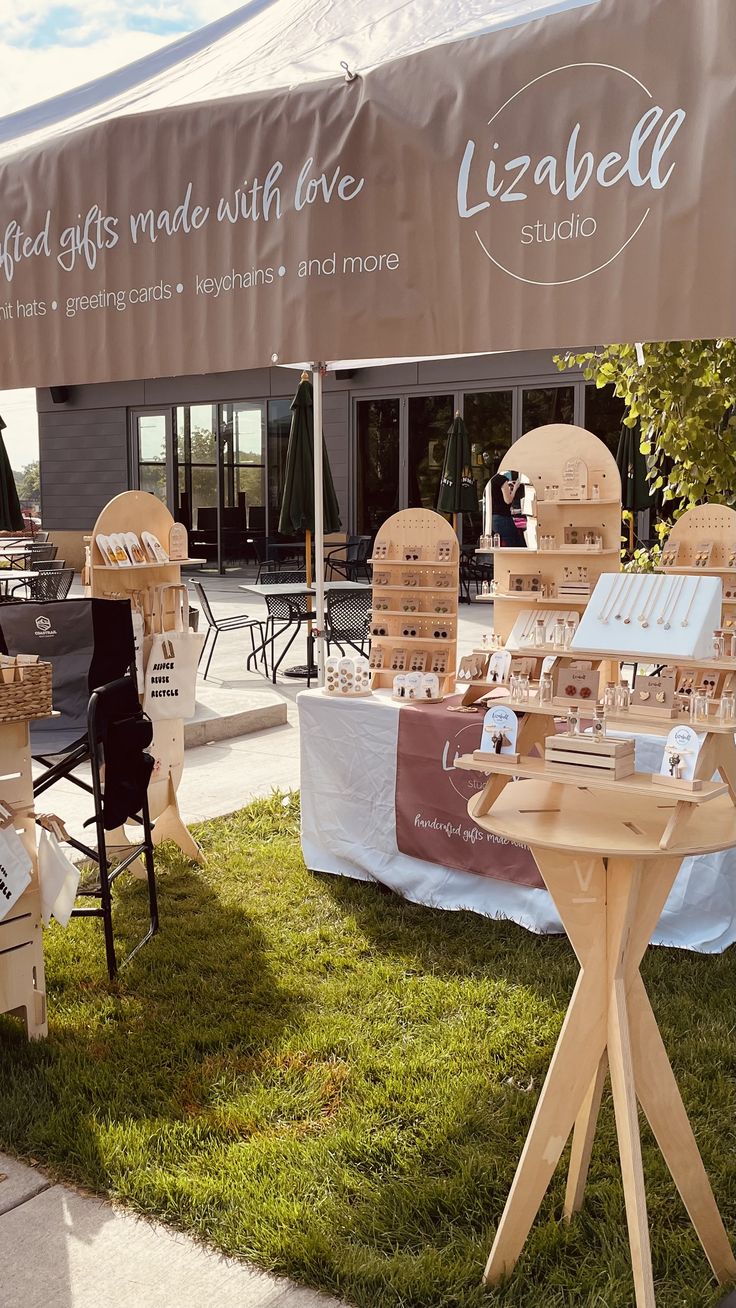 tables and chairs are set up on the grass