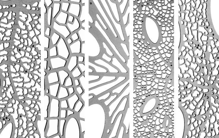 four different types of laser cutouts on white paper, each with an intricate pattern