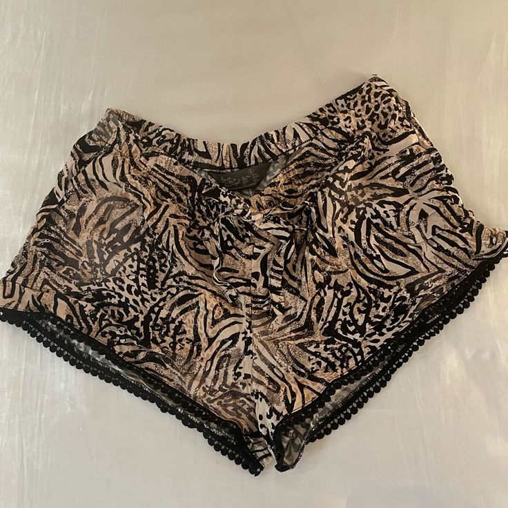 Casual Tiger Print Shorts - Tiger Print Multi Color - Brand Is International (Used Forever 21 For Publicity) - Black Detailing - Small Size 6/8 Fits A Medium And Possibly Large - Perfect Condition - Never Worn - Bought When I Lived In Brazil! - Most Reasonable Offers Accepted :) - Willing To Negotiate Tiger Print Clothes, Casual Brown Shorts For Night Out, Vacation Bottoms With Built-in Shorts By Forever 21, Forever 21 Bottoms With Built-in Shorts For Vacation, Forever 21 Stretch Bottoms For Loungewear, Forever 21 Bottoms With Elastic Waistband, Short Length, Forever 21 Stretch Loungewear Bottoms, Forever 21 Short Bottoms For Loungewear, Forever 21 Shorts For Loungewear