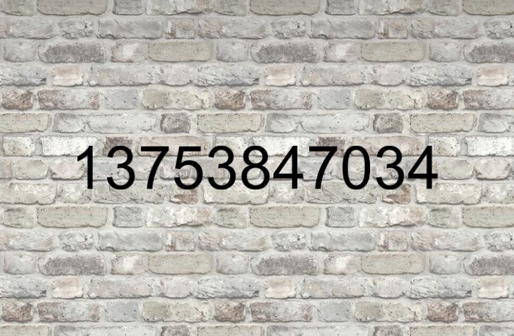 a brick wall with numbers on it and the words 12373870344