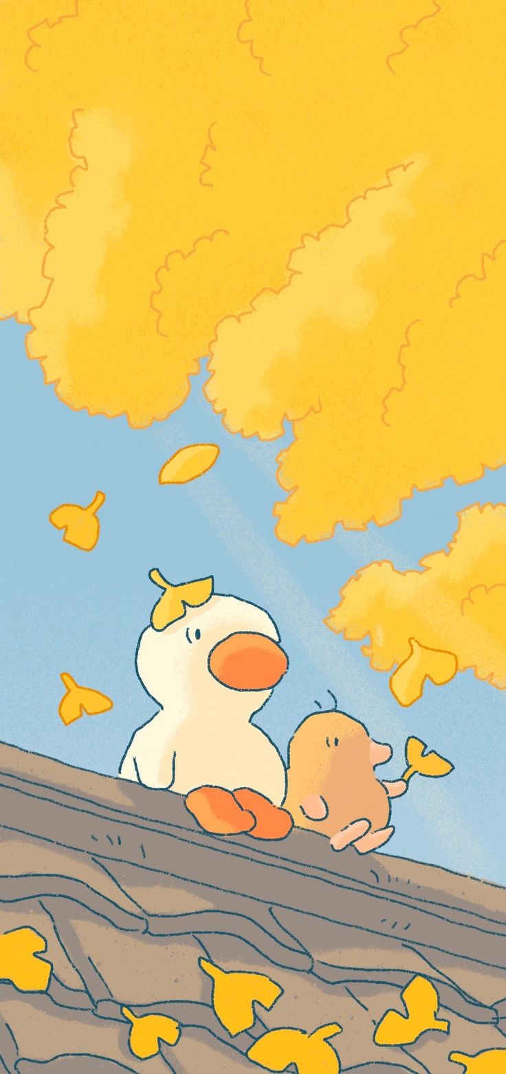 a duck and its chickling are sitting on the ground in front of some yellow leaves