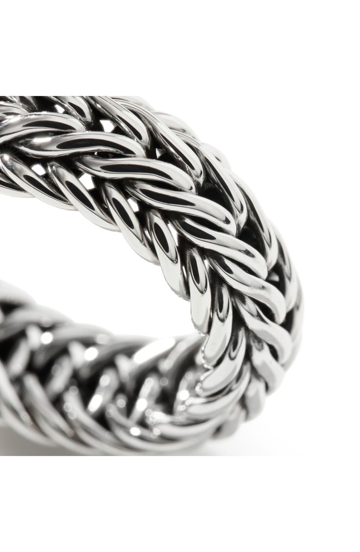 Handcrafted from sterling silver, this seamless ring is highlighted by an intricate chain. Sterling silver Imported Elegant Silver Chain Link Ring, Luxury Silver Chain Ring As Gift, Luxury White Gold Sterling Silver Chain Ring, Elegant Polished Silver Chain Ring, Elegant Silver Chain Ring With Polished Finish, Elegant Silver Link Chain Ring, Classic Silver Link Rings, Silver Sterling Chain Ring Tarnish Resistant, Silver Metal Chain Ring With Solid Link Construction