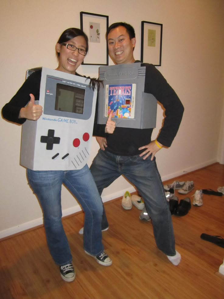 two people dressed up as nintendo bros and video game characters, posing for the camera