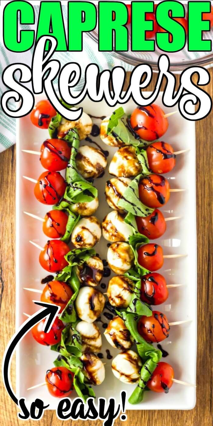 grilled caprese skewers with tomatoes and spinach leaves on them