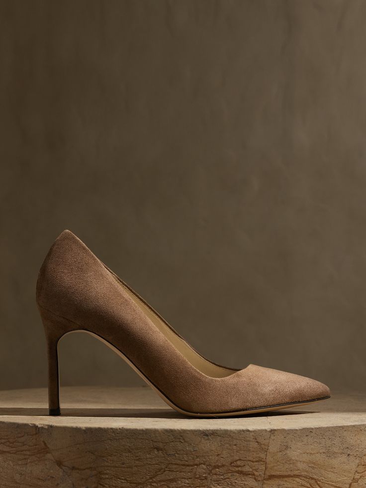 Nothing beats a classic pump.  Crafted by Italian masters, these sleek and stylish suede pumps are the perfect choice when the occasion calls for a boost of timeless confidence.  Crafted from beautiful, natural suede and leather, these shoes are desi Formal Suede Heels With Suede Lining, Elegant Suede Heels With Suede Lining, Formal Suede Court Shoes With Suede Lining, Classic Suede Court Shoes With Reinforced Heel, Classic Suede Heels, Formal Suede Court Shoes With Padded Heel, Suede Lined High Heel Court Shoes For Work, Elegant Suede Court Shoes With Deep Heel Cup, Classic Suede Court Shoes With Almond Toe