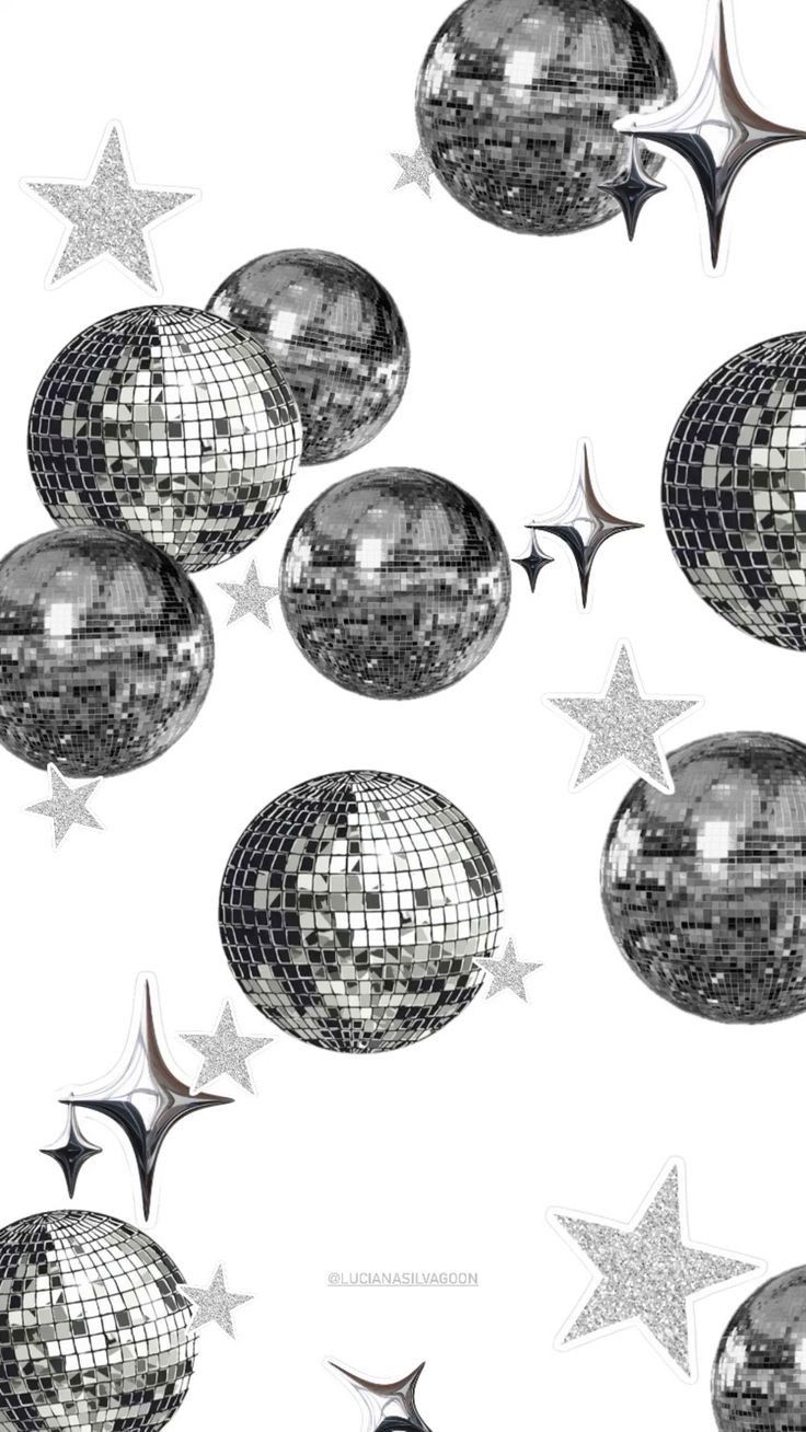 many shiny disco balls and stars on a white background