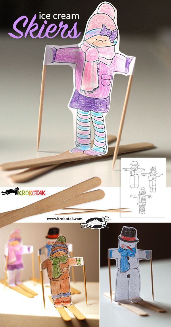 an ice cream skewer is made out of popsicle sticks and paper dolls