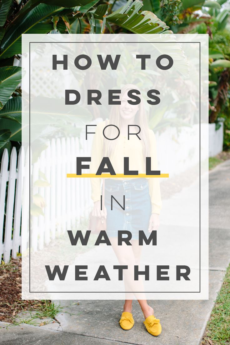 a woman standing on the sidewalk with text overlaying how to dress for fall in warm weather