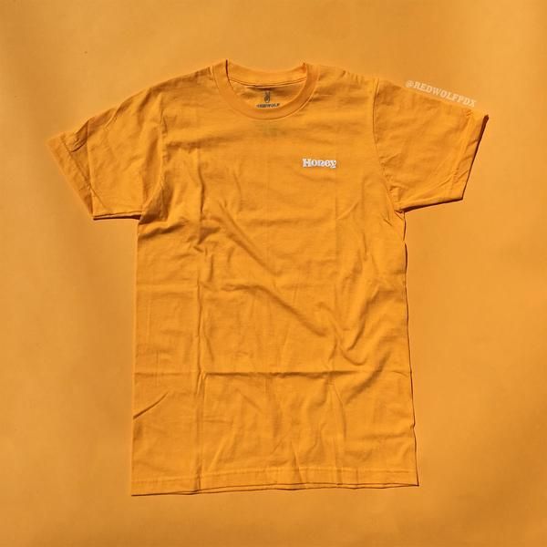 Mustard Short Sleeve T-shirt With Graphic Print, Trendy Yellow T-shirt For Streetwear, Yellow Basic Relaxed Fit T-shirt, Basic Yellow Relaxed Fit T-shirt, Yellow Relaxed Fit T-shirt For Streetwear, Yellow Screen Print Tops For Streetwear, Yellow Summer Streetwear T-shirt, Trendy Yellow Shirt With Screen Print, Yellow Cotton T-shirt With Text Print