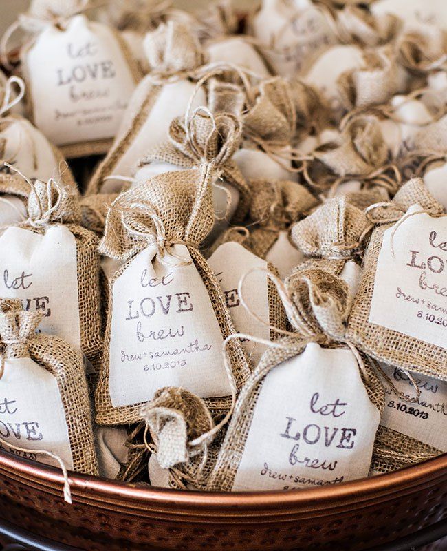 a basket full of coffee bags with the words love is in each bag on it