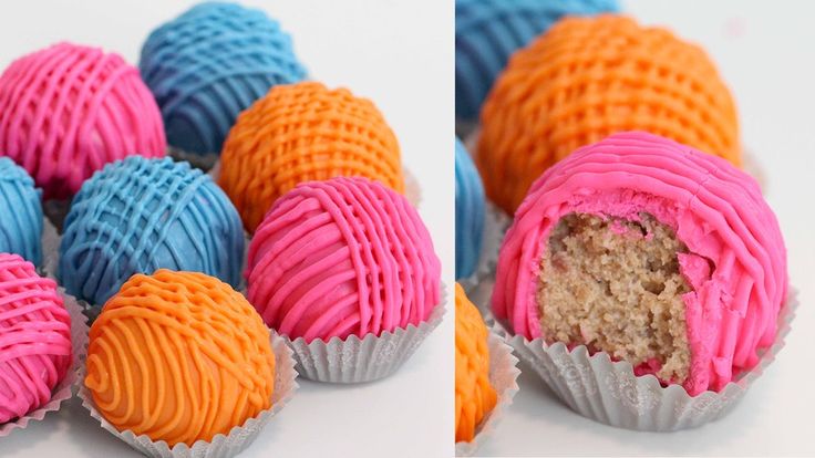 there are many different colored chocolates in the same cupcake wrapper, and one is half eaten