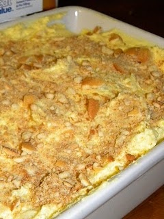 a casserole dish is sitting on a wooden table