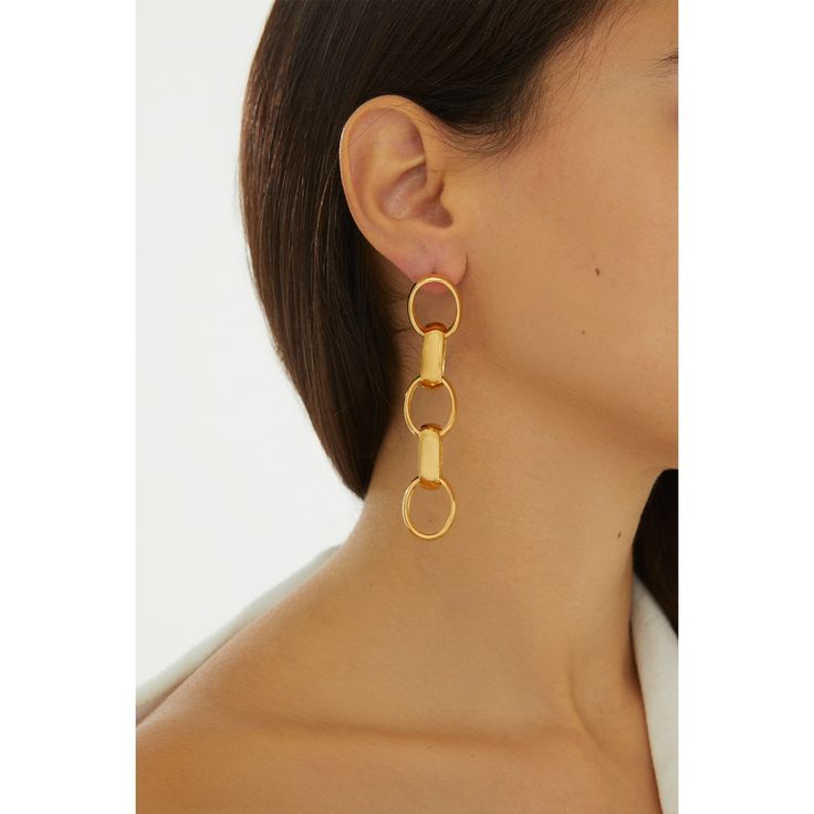 Perfect your look with a pair of luxe gold chain earrings. With their minimalist, eye-cathing design, the delicate and sophisticated Neith Chain Earrings will add an instant touch of glamour to your everyday look.  Handcrafted with 24k Gold plated brass Nickel, lead and cadmium free Earring pins are made of gold plated 925 silver which are non-allergenic Suitable for pierced ears Care To prevent oxidization and maintain long durability, keep your jewelry free of perfume, lotions, and sprays while using. It is advised to remove your gold-plated jewelry before showering. Make sure to store each piece of jewelry in the jewelry case provided or wrapped up in a soft cloth to prevent scratching. It is recommended to gently wipe the surface of your gold-plated jewelry after each use with a non-ab Modern Chain Earrings As Gift, Minimalist Chain Link Metal Earrings, Minimalist Metal Chain Link Earrings, Modern Dangle Earrings With Cable Chain, Modern Chain Link Earrings For Everyday Wear, Modern Chain Drop Earrings, Modern Cable Chain Drop Earrings, Chic Earrings With Adjustable Chain In Metal, Chic Earrings With Adjustable Chain