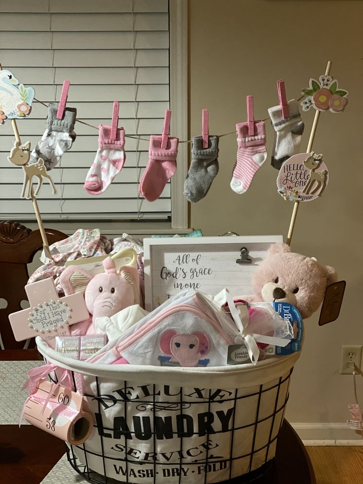 a basket filled with baby items on top of a table